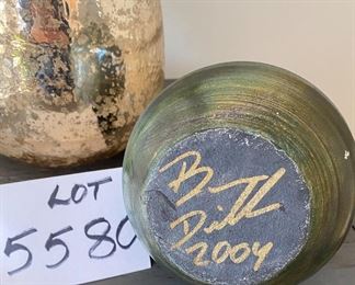 Lot 5580. $38.00. Two Lovely vases - first is just shy of 12" tall, about 8" in diameter with Mercury Style Glass - Stunning, and the second is a 6x6" Nice Studio Pottery Vase, signed. Outstanding Decor.