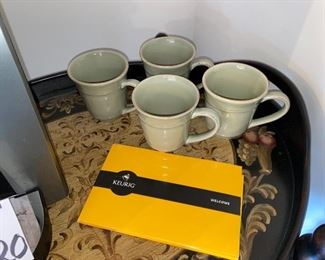 Lot 5520. $65.00. Keurig Machine, a glass canister (perfect for storing K-Cups or beans), and 4 Pottery Barn Mugs.