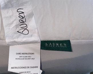 Lot 5615. $425.00. Queen Bed, With Nailhead and Fabric Headboard, Ralph Lauren premier mattress pad, comforter (Duvet?), 4 pillows and shams (2 are Euro) pillowtop mattress by Beauty Rest Wilshire Plus comfortable.