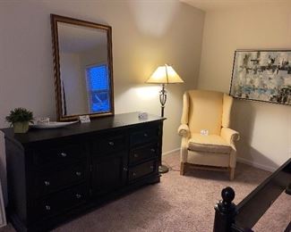 Lot 5603. $1,625.00 King Bedroom Set Includes Pennsylvania House Steve Tyrell Collection King 2 poster Headboard, (see index card following for story) Footboard and Frame, 73" tall, a tall Black chest dresser 38"w x 19" d, x53" tall 6 drawers; not branded, and 7 drawer dresser with cabinet with 2 drawers, 66" x 19" d x 33.5" unbranded as well, also in Black.