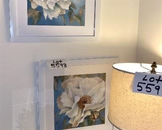 Lot 5593. $30.00. Pair of pretty floral prints in a white frame. 17.5" x 18"