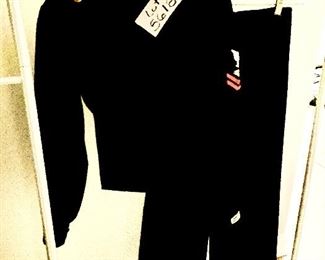 Lot 5618. $50.00. This, believe it or not, was our homeowner's WW2 era US Navy Uniform. It is quite small but would make a great kid's Halloween costume. If I had to guess the size it would be an XS adult, maybe a size 5 ladies. Nice piece of history!