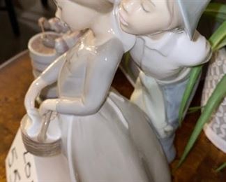Lot 5597. $95.00. NAO by Lladro "Courting Couple With Basket" 13" s 7"w
