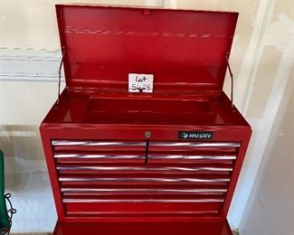Lot 5624 $225.00 Tool Chest Combo includes: 1) Red Craftsman Quiet Glide Bottom Tool Chest 5 Drawer on Wheels with Lock and Key. 2) Husky 8 Drawer Top Tool Chest with Flip up Top with New Tool Caddy. Craftsman: 27" W x 18" D x 34" H; Husky: 26.5" W x 12.5" D and 19" H