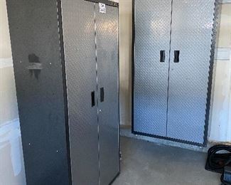 Lot 5625 $450.00 2 Gladiator by Whirlpool. Heavy Duty Steel Cabinets with Grey Hammered Doors and Granite Finish, 3 Adjustable Shelves either Floor Standing or on Wall Hanging on Gladiator Brackets. Definite upgrade for your garage...We never get to sell these because the new homeowner's usually included in the contract. 36" W x 18" D x 72" H