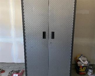 Lot 5625 $450.00 2 Gladiator by Whirlpool. Heavy Duty Steel Cabinets with Grey Hammered Doors and Granite Finish, 3 Adjustable Shelves either Floor Standing or on Wall Hanging on Gladiator Brackets. Definite upgrade for your garage...We never get to sell these because the new homeowner's usually include in contract. 36" W x 18" D x 72" H