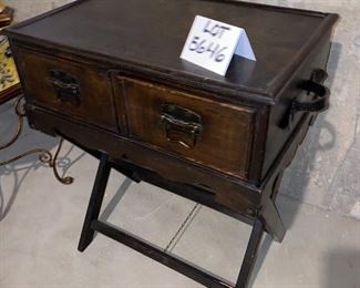 Lot 5646. $38.00. 2- Drawer Cabinet sits on Luggage Rack - wood with 2 leather handles.