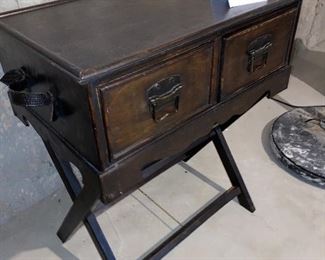 Lot 5646. $38.00. 2- Drawer Cabinet sits on Luggage Rack - wood with 2 leather handles.