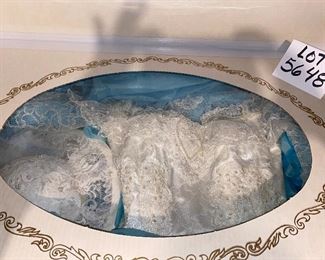 Lot 5648. $100.00. Gorgeous Bridal Dress, Hat, Sealed in Keepsake Pack Photos show the dress as worn once and cleaned and sealed away. See photo of bride to see what dress looks like; dress is in perfect condition.