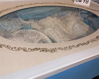 Lot 5648. $100.00. Gorgeous Bridal Dress, Hat, Sealed in Keepsake Pack Photos show the dress as worn once and cleaned and sealed away. See photo of bride to see what dress looks like; dress is in perfect condition.