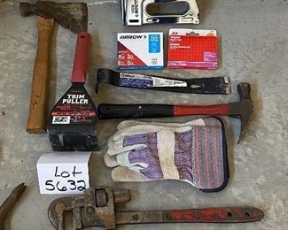 Lot 5632 $28.00. Misc tool Lot includes Hatchet, Trim Puller, Crow Bar, Pipe Wrench, Stanley Bostitch Stapler, and Staples and Pry Bar.