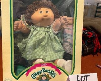 Lot 5649. $125.00. The Original 1985 Cabbage Patch Doll "Martina Hettie" New in Box with Birth Certificate, Wrist Band, Made By Coleco.