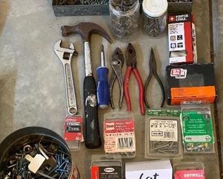 Lot 5634 $20.00 Tools and Hardware Lot includes: Hammer, Wrench, Pliers and lots of nails, screws and fasteners