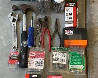 Lot 5634 $20.00 Tools and Hardware Lot includes: Hammer, Wrench, Pliers and lots of nails, screws and fasteners
