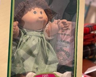 Lot 5649. $125.00. The Original 1985 Cabbage Patch Doll "Martina Hettie" New in Box with Birth Certificate, Wrist Band, Made By Coleco.