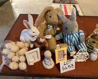 Lot 5653. $35.00. Easter Bunny Lot: Includes 3 Plush Bunnies (may be Vintage; cute), One Bunny Candle Holder, Chalkware White Bunny, 3 Easter frames, 1 Prec. Moments Boy Holding egg, 1 Bunny Porcelain Bell andf 16 Speckled Eggs. (Use for Centerpiece with Faux Grass and a Basket.