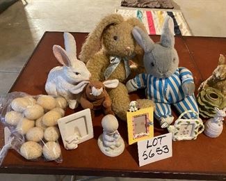 Lot 5653. $35.00. Easter Bunny Lot: Includes 3 Plush Bunnies (maybe Vintage; cute), One Bunny Candle Holder, Chalkware White Bunny, 3 Easter frames, 1 Prec. Moments Boy Holding egg, 1 Bunny Porcelain Bell andf 16 Speckled Eggs. (Use for Centerpiece with Faux Grass and a Basket.