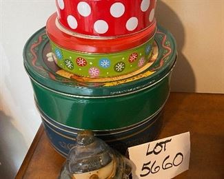 Lot 5660. $15.00. Holiday Cookie Tins of various sizes and a cute little figurine of a South Park Kid (lol, this is a snowman).