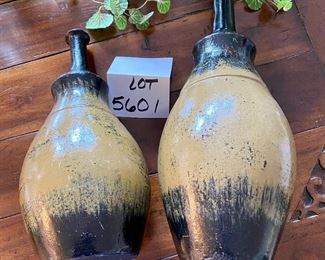 Lot 5601. $25.00. Two narrow neck vases 18" t x 7" diameter at fullest, other is 15" tall x 6" diameter - makes a nice pair on display.
