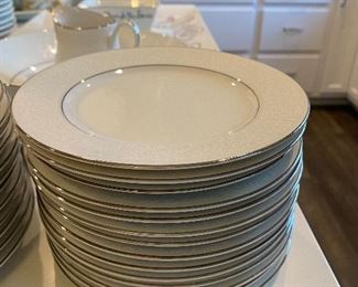 Lot 5602. $170.00. Service for at least 12 "Grace" Fine China "Concerto" pattern - Textured Rim, White with a Simple Ring of Silver on base and Rim. 43 pcs-- 14 Dinner, 12 Salad, 14 B&B, Large Oval Platter, Round Veggie Dish & Creamer. I think when they moved one box was lost, in the move so there are no cups and saucers nor a sugar bowl! Still, you can set a beautiful table with these items in time for Easter Sunday!