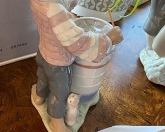 Lot 5596. $125.00. Lladro #06277 "Caribbean Rhythm" made exclusively for "Little Switzerland" 8" tall, x 4" deep. Young Man Banging on Drums!
