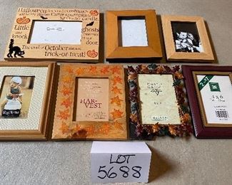 Lot 5688 $35.00 Picture Frame Lot 4 1) 3.5" x 5" Photo Frame 2) 4" x 6" Photo Frame with Leaf Edge 3) 4" x 6" Brown Wood Photo Frame 4) 3.5" x 5" Leaf Photo Frame 5) 3.5" x 5" Photo Frame 6) 4" x 6" Halloween Photo Frame 7) 4" x 6" Photo Frame