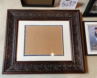 Lot 5687 $40.00 Picture Frame Lot 3: 1) Ornate 8" x 10" Photo Frame 2) Black 8" x 10" Photo Frame 3) 5" x 7" Black Photo Frame 4) 5" x &" Black Photo Frame