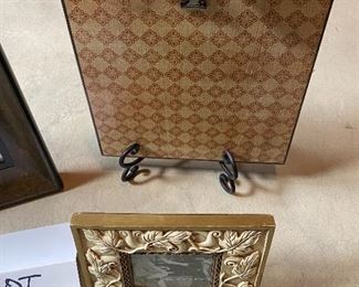 Lot 5685 $25.00 Picture Frame Lot 1: 1) 8"x10" wood embossed picture frame 2) 9" x 9" Clip Picture Frame with Bow on Top