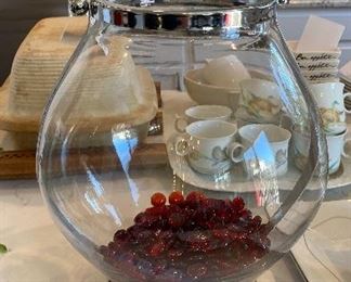 Lot 5620. $25.00. Beautiful Large Hurricane Lamp with Handle, Holds large Pillar Candle and Filled with Red Marbles