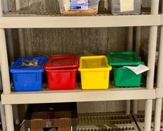 Lot 5664 $24.00 Ea. 3 Plastic 5 Shelf Units (Buy all 3 for $70.00). The stuff on them is not included in this lot.