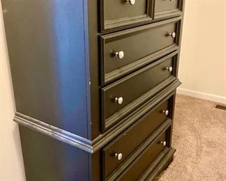 Lot 5603. $1,625.00 King Bedroom Set Includes Pennsylvania House Steve Tyrell Collection King 2 poster Headboard, (see index card following for story) Footboard and Frame, 73" tall, a tall Black chest dresser 38"w x 19" d, x53" tall 6 drawers; not branded, and 7 drawer dresser with cabinet with 2 drawers, 66" x 19" d x 33.5" unbranded as well, also in Black.