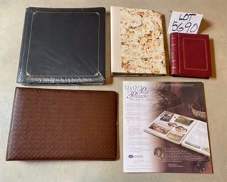 Lot 5690 $45.00 Picture Frame Lot 6 1) 12" x 12" Photo Scrap Book Album 2) 12" x 12" Page Protectors 3) Scrap Booking Combination Pack 4) 4" x 6" Photo Album 5) 4" x 6" Photo Album 6) 4" x 6" Photo Album 7) 4" x 6" Photo Album