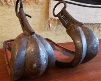 Pair of antique Japanese Abumis, stirrup for horse-riding, in cast iron with elaborate silver inlay.