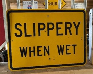 Slippery When Wet Metal Sign