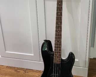 Silvertone bass guitar - pulled by homeowner I apologize.