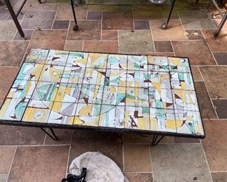 Vintage mosaic on iron base table 32.5"w x 17"d x 15.5"h. $40 as found