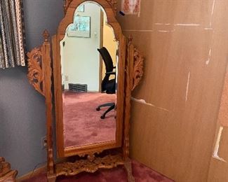 Carved standing mirror. 38" w X 69" h. Priced and sold with bedroom set