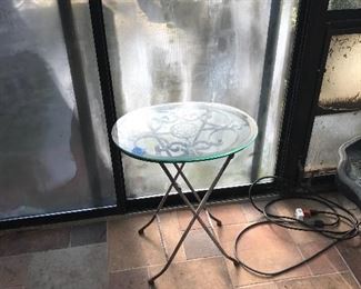 wrought iron table with glass top $28