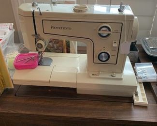Kenmore sewing machine in sewing table