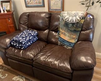 Leather power reclining love seat