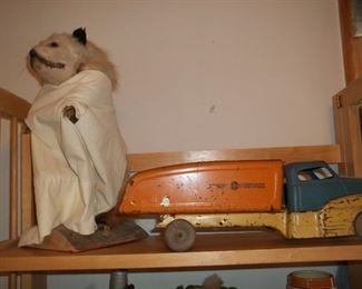 Buddy L dump truck and opossum