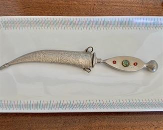 Detail; Decorative small dagger, with sheath.