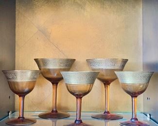 $40 - Vintage gold encrusted stemware; Two champagne glasses and three cordial glasses. Champagne glasses 5.25” H and cordial glasses 4”H.