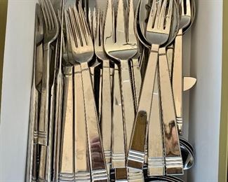 $60 - Lenox Flatware.  12 dinner forks, 12 salad forks, 12 teaspoons, 11 soup spoons, two serving spoons, one serving fork, one sugar spoon and one butter knife.