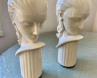 $40 - Pair of ceramic decorative figurines.  9"H x 2"D base.