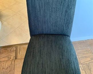 $600 Set of six black upholstered dining chairs.  38"H x 19.5"W x 22"D (seat height 19"H)