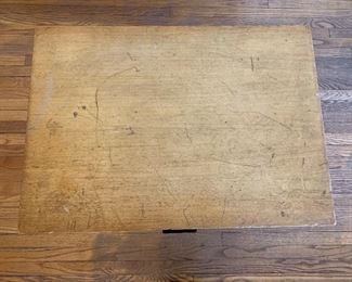 Detail; top of Singer sewing machine cabinet.