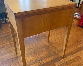 Detail; Singer sewing machine cabinet.