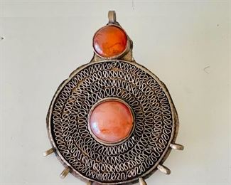 $30 - Vintage brass statement pendant with orange stones; 2.5” D