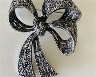 $15 - Signed LR marcasite bow pin; approx 3” 
